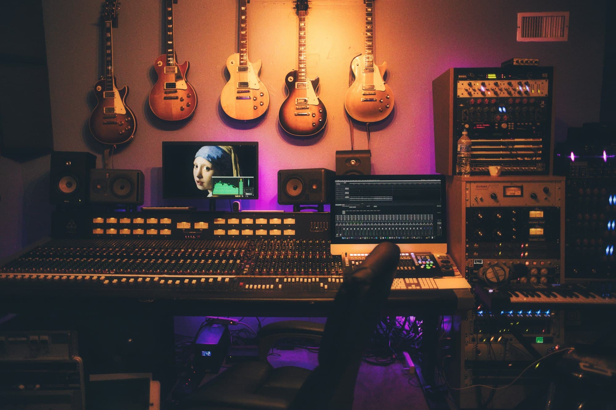 Professional audio mixer representing commercial sound systems